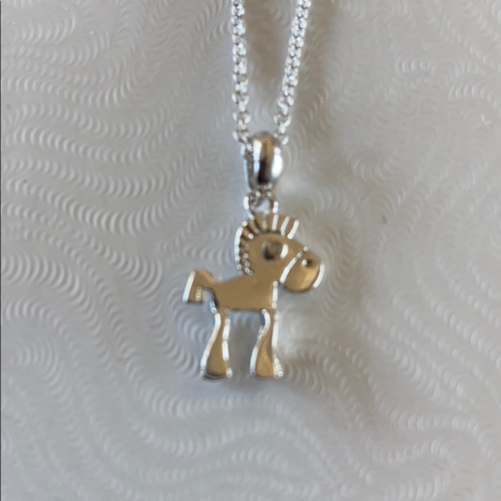 Tiny horse necklace on adjustable chain. Brand new